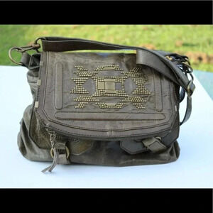 The Sak studded fold over shoulder bag